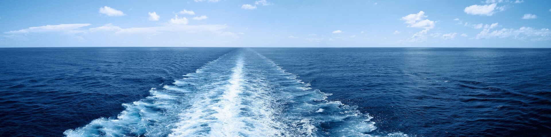 Sea with waves caused by a ship